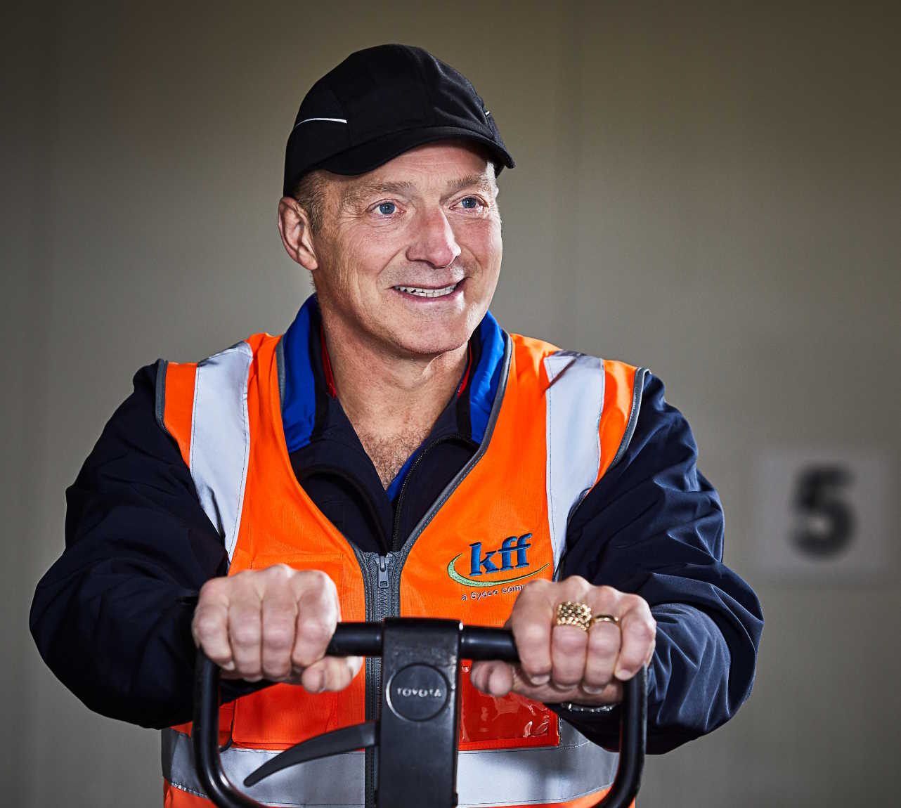 Worker operating trolley