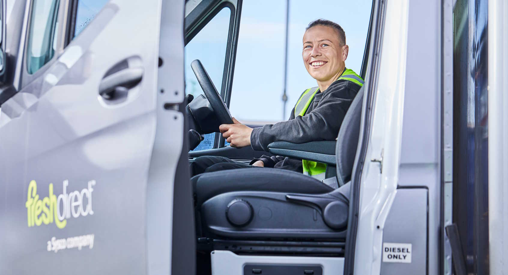 Fresh Direct driver in lorry cab